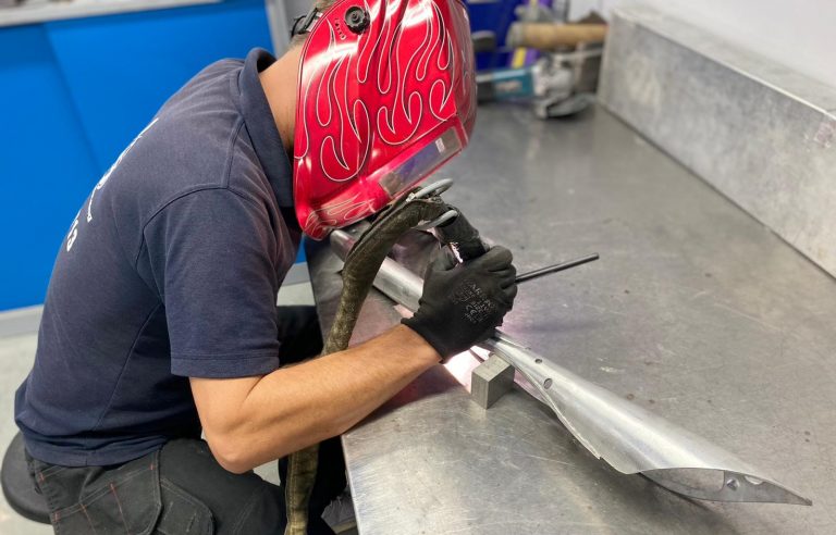 Nige Andrews welding the torch for the Commonwealth Games 2022.