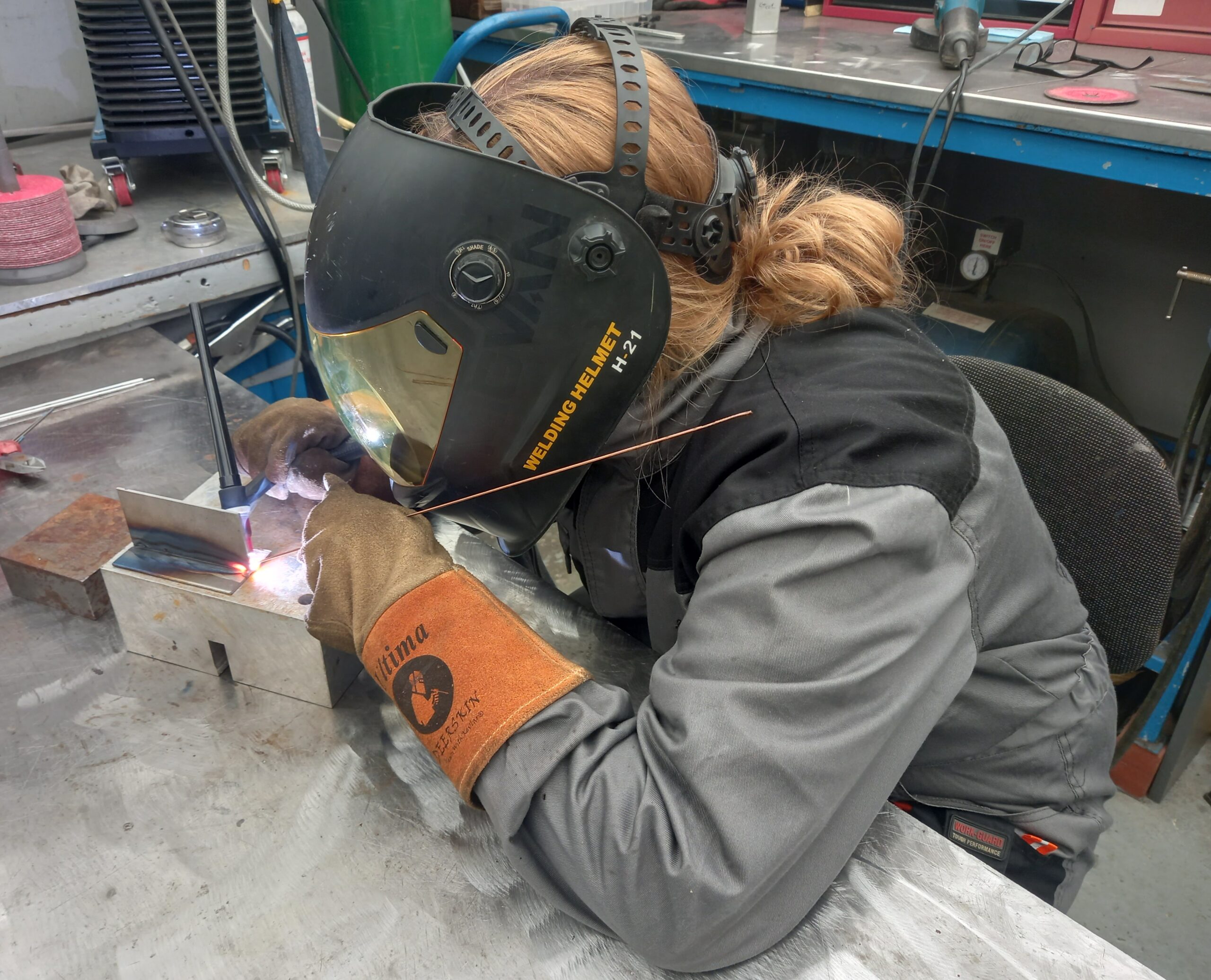 Women welding during course on mig welding
